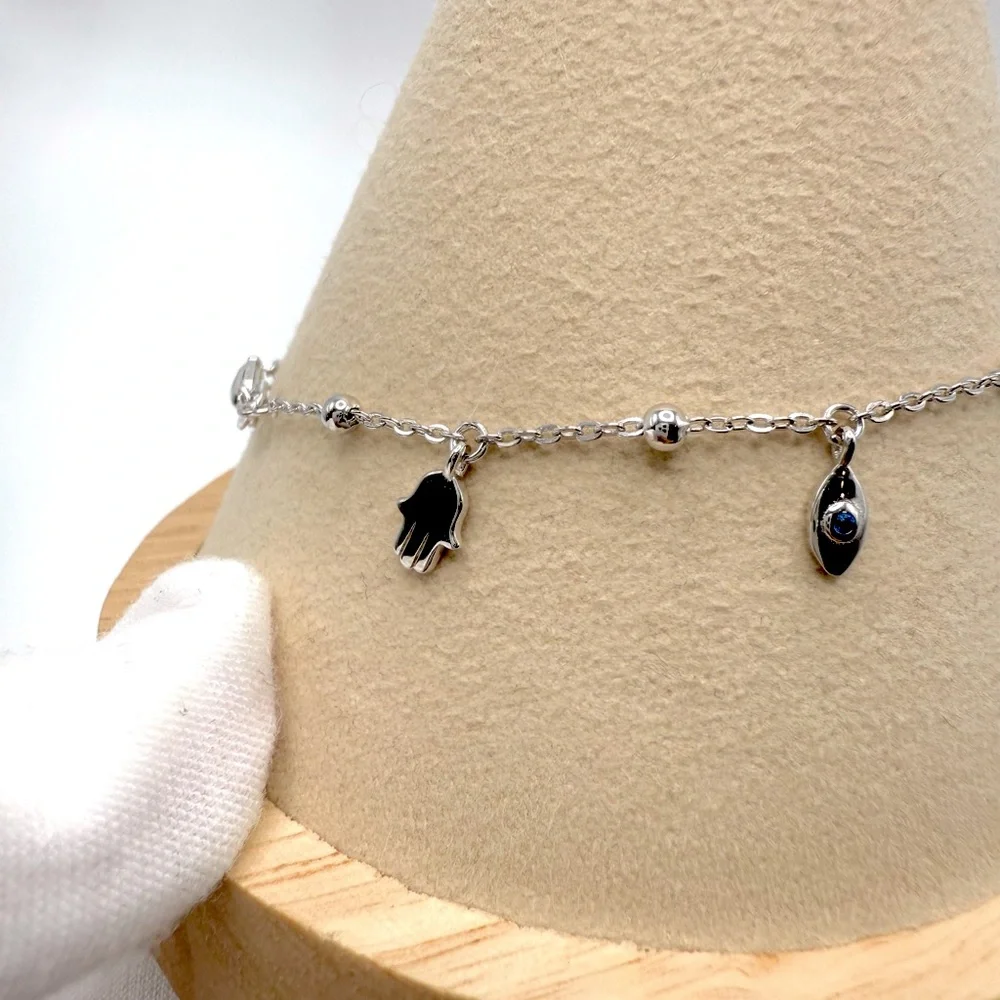 6.75” Dainty .925 Sterling Silver Dangle Eye, Cross and Hamsa Charm Bracelet